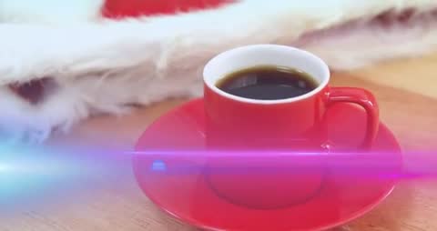 Festive Coffee Moment with Red Cup and Flare Lighting