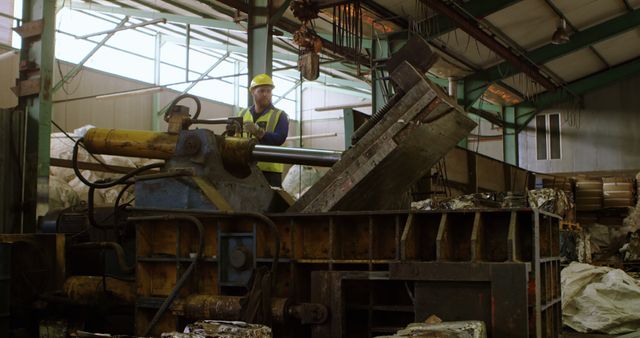 Industrial Worker Operating Metal Press Machine in Factory - Download Free Stock Images Pikwizard.com