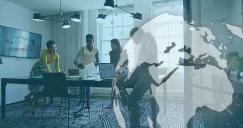 Diverse team collaborating with global business interface overlay