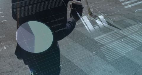 Businessperson analyzing global financial data while crossing street
