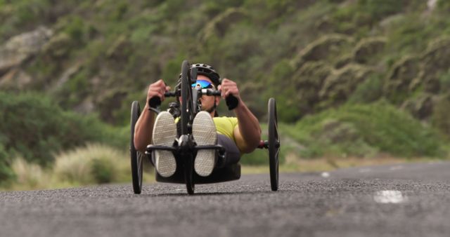 Focused Cyclist Riding Handcycle on Rare Mountain Road - Download Free Stock Images Pikwizard.com