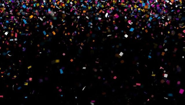 Colorful Confetti Falling on Dark Background