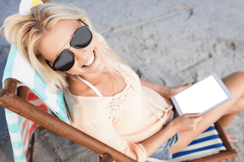 Smiling Woman with Tablet on Beach, Transparent Concept Design - Download Free Stock Videos Pikwizard.com