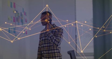 Businessman collaborating with digital interface projection