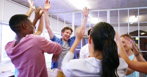 Team-Building Success Celebration in Office Environment