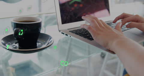 Animated Eco Icons Floating Over Coffee and Technology Setup