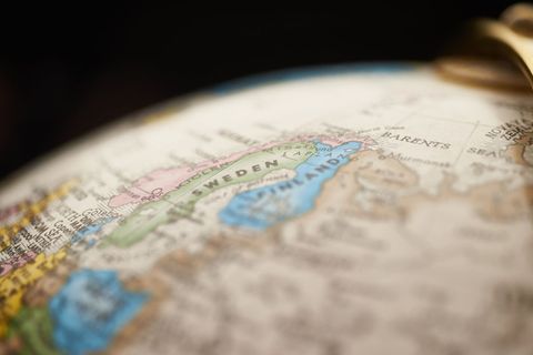 Highlighting Sweden on Vintage Globe Close-up, Scandinavian Map Focus on Baltic Sea