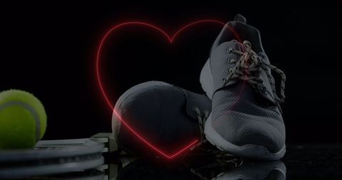 Sports Shoes with Neon Heart Symbol Fitness Inspiration