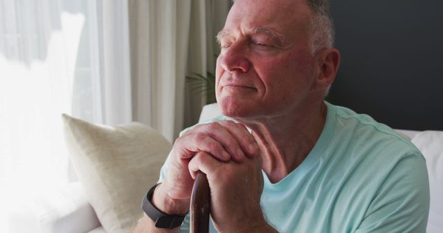 Elderly Man Reflecting in Sunlit Living Room - Download Free Stock Images Pikwizard.com