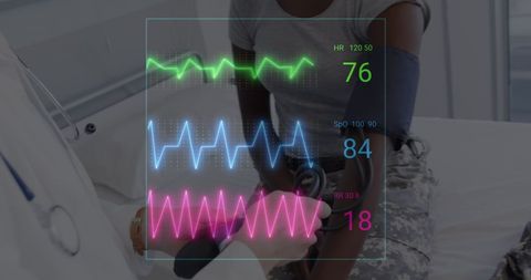 Doctor Monitoring Vital Signs Using Digital Interface