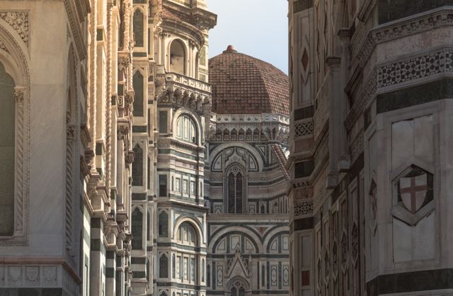 A detailed exterior view of the iconic Florence Cathedral and Campanile showcases intricate Renaissance architecture. Ideal for travel blogs, educational material, postcards, and tourism promotions highlighting Italy's rich historical heritage.