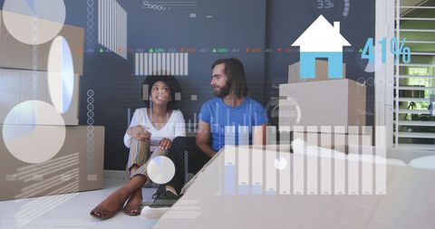 Diverse Couple Moving with Digital Data Interface