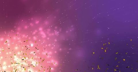 Bursting warm light flare filling frame with gold confetti and purple pink bokeh glow