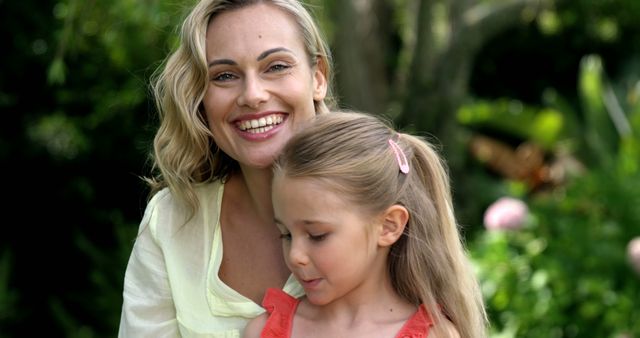 Happy Mother with Daughter in Garden - Download Free Stock Images Pikwizard.com