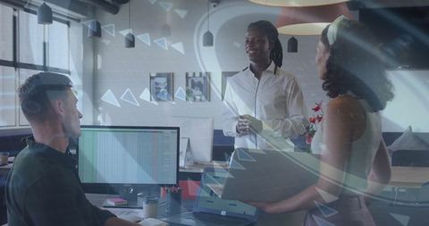 Diverse Team Collaborating on Business Strategy in Modern Office Environment