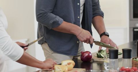 Couple preparing food together for joyful celebration
