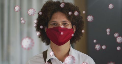 Man with face mask and floating virus cells concept