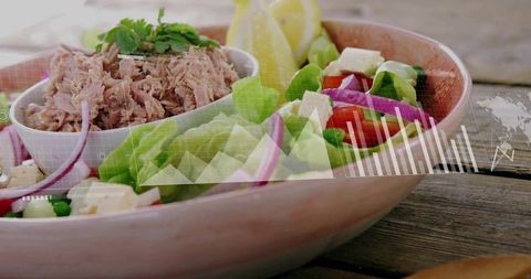 Tuna salad with data overlay on rustic wooden table, fresh mediterranean bowl analytics
