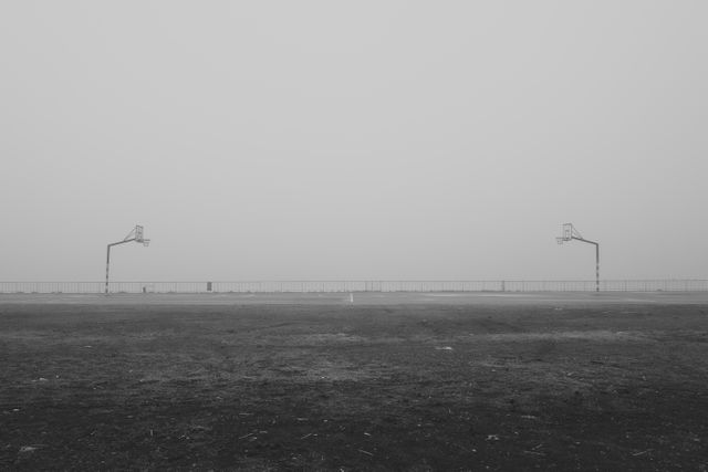 Abandoned Basketball Court in Fog with Minimalist Landscape - Download Free Stock Images Pikwizard.com