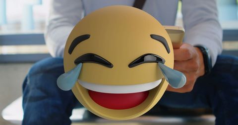 Laughing Emoji Overlay with Smartphone and Coffee