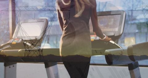 Woman Running on Treadmill with Digital Graph Overlay