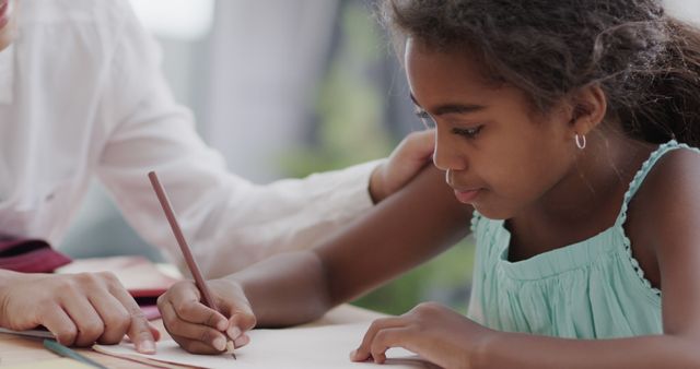 Mother Assists Daughter with Homework and Learning - Download Free Stock Images Pikwizard.com