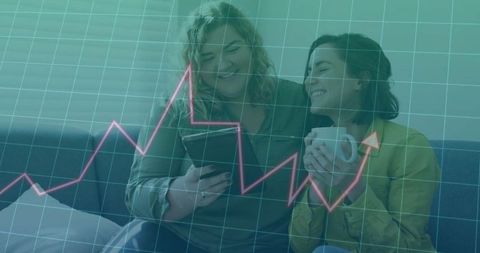 Caucasian couple analyzing data on digital tablet at home