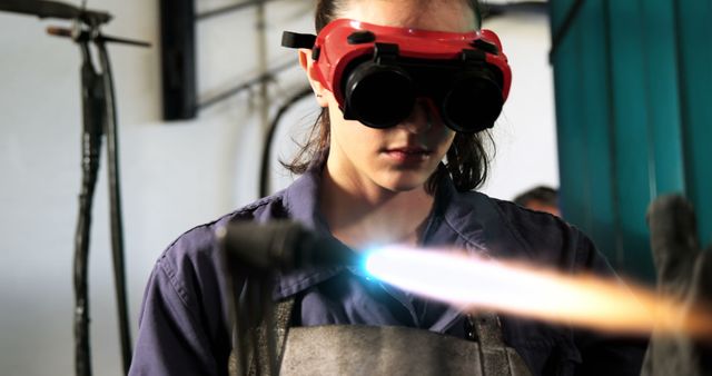 Young Female Technician Handling Blowtorch in Workshop - Download Free Stock Images Pikwizard.com