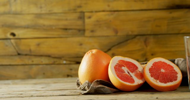 Fresh Grapefruit Halves on Rustic Wooden Table - Download Free Stock Images Pikwizard.com