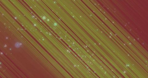 Bright Streaks and Particles on Orange Gradient Background