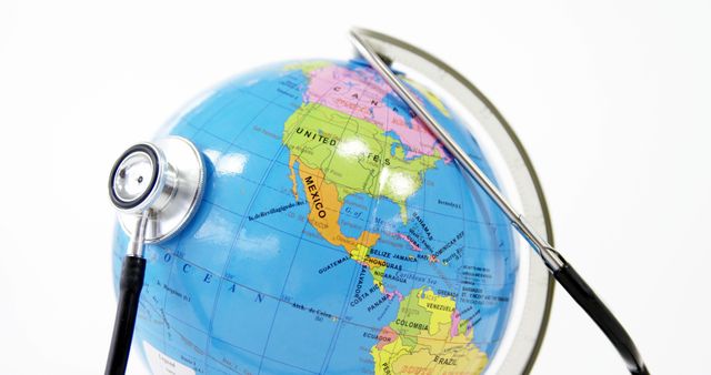 Stethoscope Resting on Globe Representing Worldwide Healthcare - Download Free Stock Images Pikwizard.com