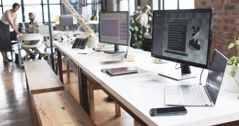 Modern Urban Workspace with Creative Professionals Collaborating - Download Free Stock Images Pikwizard.com