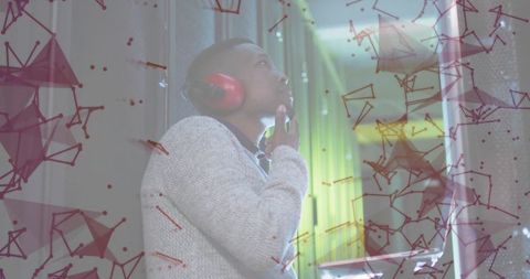 Contemplative Engineer in Soundproofed Studio with Futuristic Design