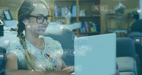 Woman with Glasses on Laptop Surrounded by Social Media Icons