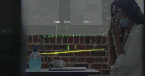 Caucasian Businesswoman Analyzing Data with Graphs Overlay