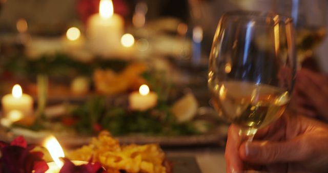 Cozy Candlelit Dinner with Glass of White Wine and Delicious Food Spread - Download Free Stock Images Pikwizard.com