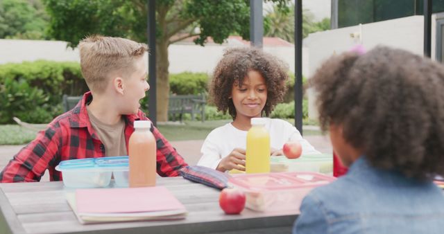 Diverse Children Enjoying Lunch Outdoors at Picnic Table - Download Free Stock Images Pikwizard.com