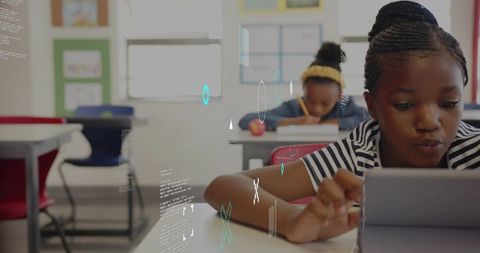 Young Student Engaging with Digital Tablet in Classroom for Learning