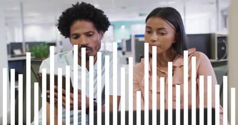 Diverse Team Analyzing Data on Smartphone in Modern Office Space