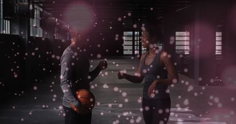 Positive Team Dynamics with Basketball Players Surrounded by White Bokeh