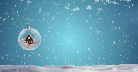 Whimsical Christmas Bauble with Snowy Landscape and Snowflakes