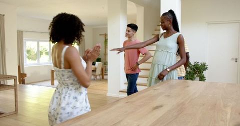 Close friends socializing in a modern home environment