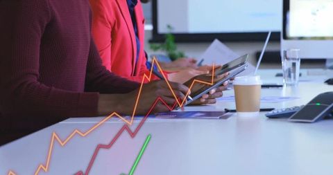 Business Colleagues Analyzing Digital Trends in Modern Office