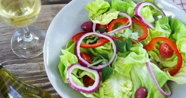 Fresh Garden Salad with Mixed Vegetables and Wine - Download Free Stock Images Pikwizard.com