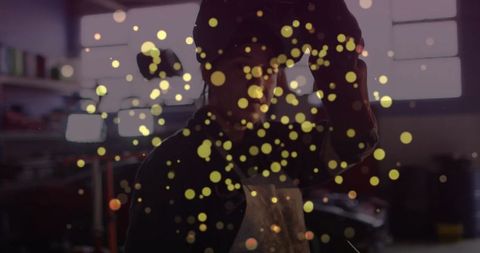 Metalworker in workshop embracing industrial craftsmanship