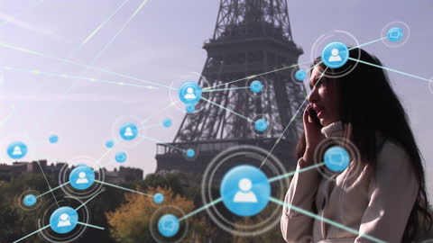 Woman Using Smartphone Amidst Digital Network Over Paris
