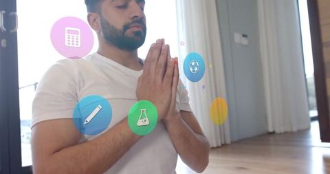 Man Meditating with Digital Interface and Media Icons