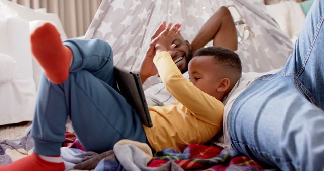 Father and Son Enjoying Time in Indoor Blanket Fort - Download Free Stock Images Pikwizard.com