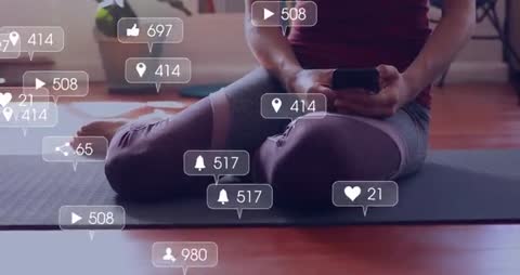 Woman Engaging Technology in Yoga Routine with Social Media Notifications