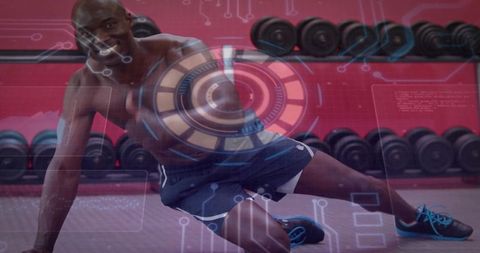 Shirtless athlete doing mobility stretch with hud overlay at gym dumbbell rack